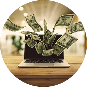 Dollar bills flying from laptop symbolizing online income